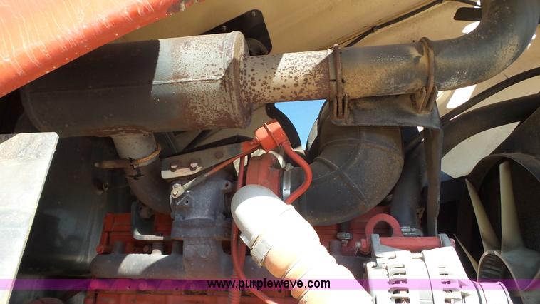 image for item BZ9071 2014 MacDon M205 self-propelled windrower