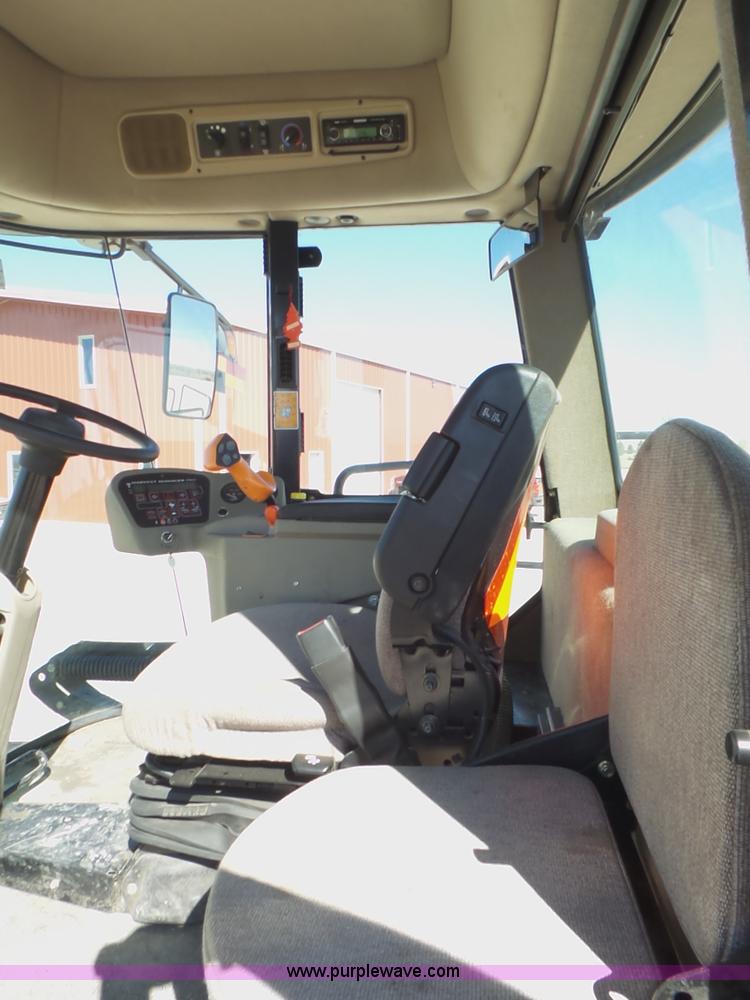 image for item BZ9071 2014 MacDon M205 self-propelled windrower