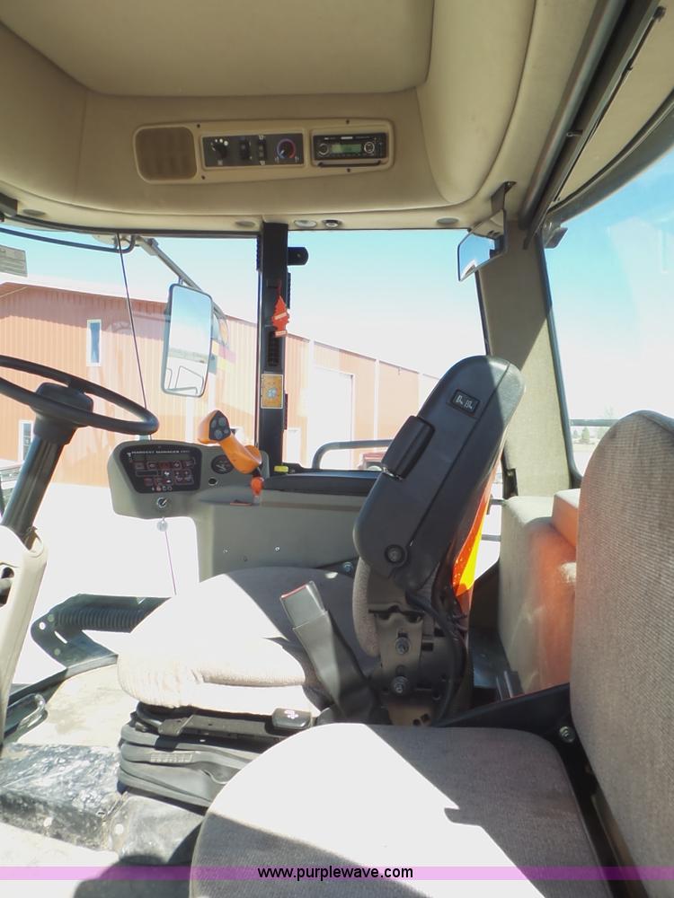 image for item BZ9071 2014 MacDon M205 self-propelled windrower