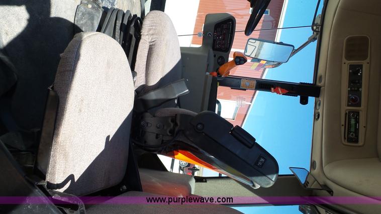 image for item BZ9071 2014 MacDon M205 self-propelled windrower