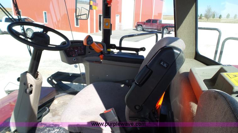 image for item BZ9071 2014 MacDon M205 self-propelled windrower