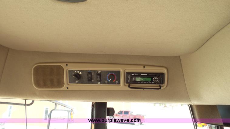 image for item BZ9071 2014 MacDon M205 self-propelled windrower