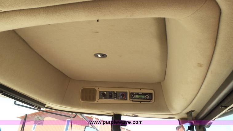 image for item BZ9071 2014 MacDon M205 self-propelled windrower