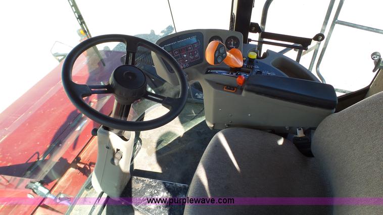 image for item BZ9071 2014 MacDon M205 self-propelled windrower