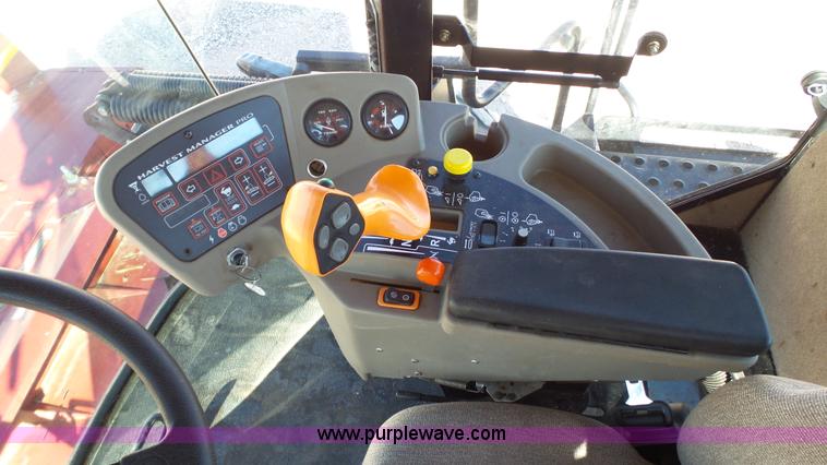 image for item BZ9071 2014 MacDon M205 self-propelled windrower