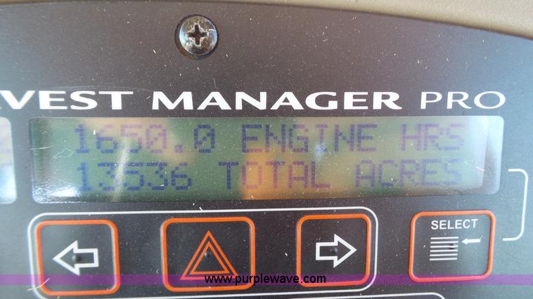 image for item BZ9071 2014 MacDon M205 self-propelled windrower