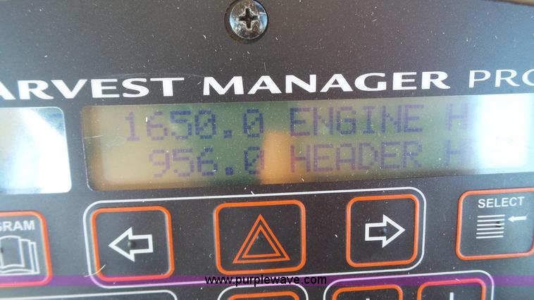 image for item BZ9071 2014 MacDon M205 self-propelled windrower