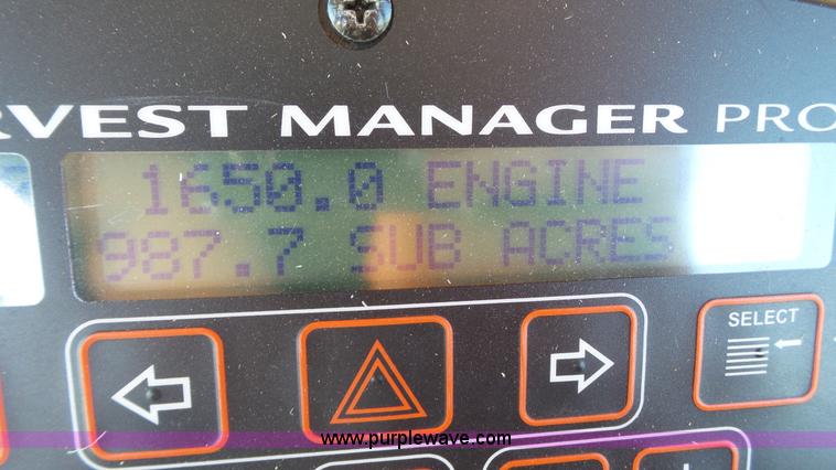 image for item BZ9071 2014 MacDon M205 self-propelled windrower