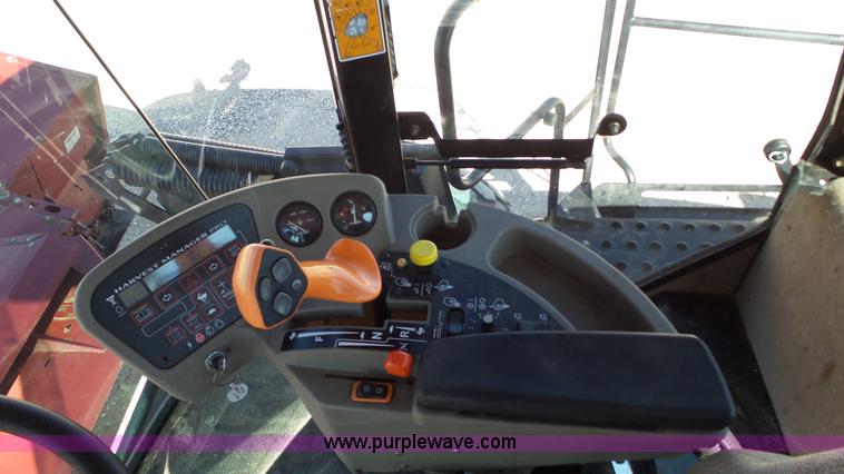 image for item BZ9071 2014 MacDon M205 self-propelled windrower