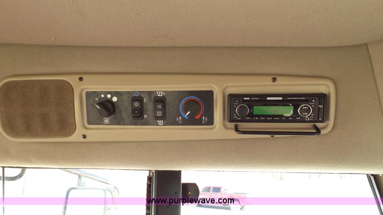 image for item BZ9071 2014 MacDon M205 self-propelled windrower