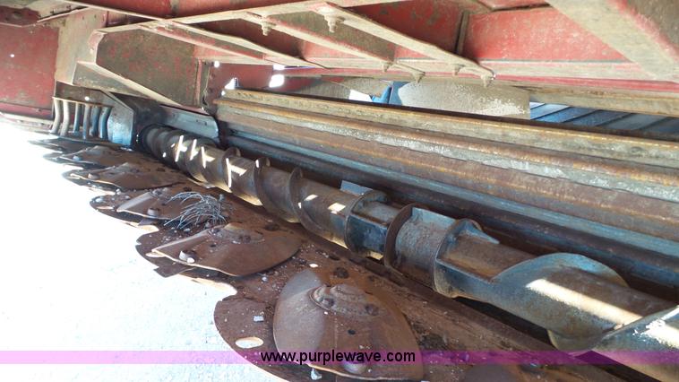 image for item BZ9071 2014 MacDon M205 self-propelled windrower