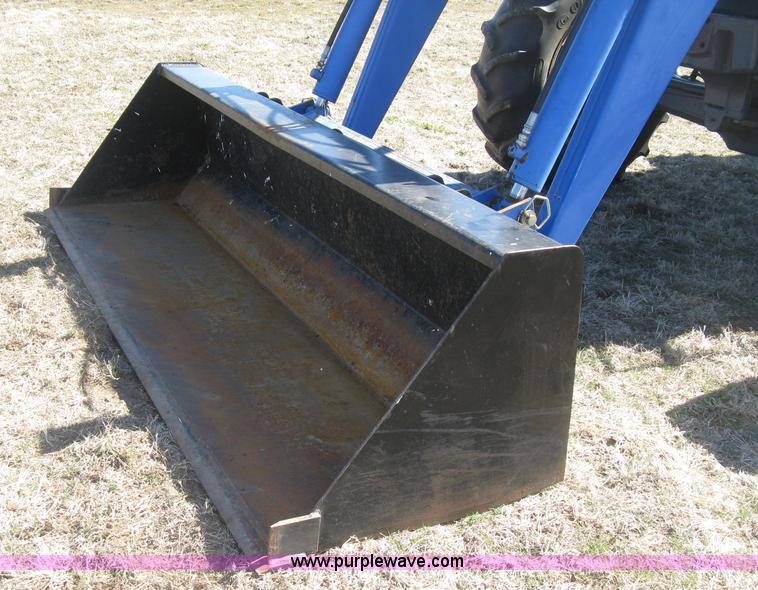 image for item J2886 1996 New Holland 7740 MFWD tractor