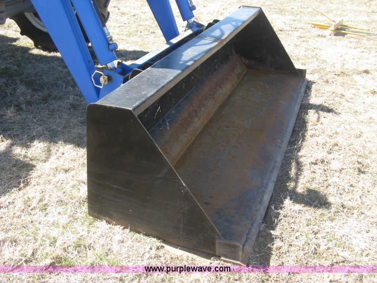 image for item J2886 1996 New Holland 7740 MFWD tractor