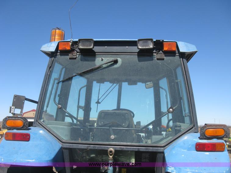 image for item J2886 1996 New Holland 7740 MFWD tractor