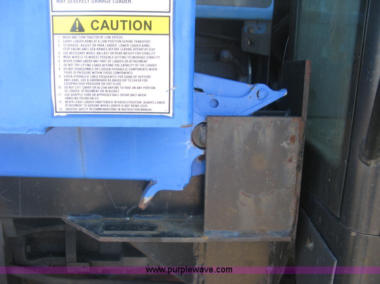 image for item J2886 1996 New Holland 7740 MFWD tractor