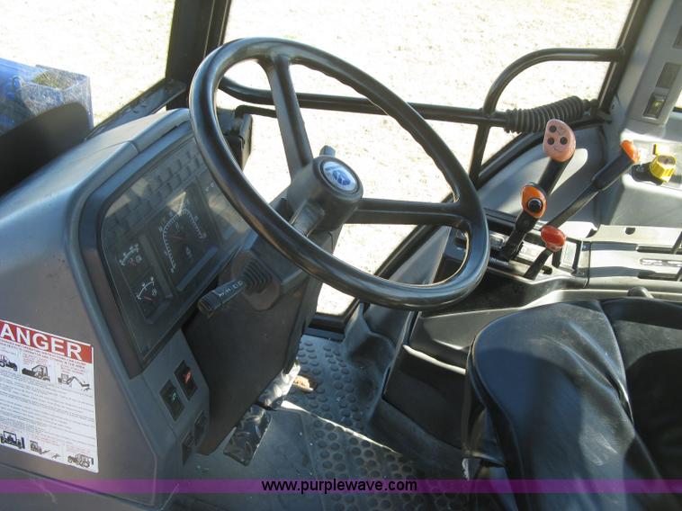image for item J2886 1996 New Holland 7740 MFWD tractor
