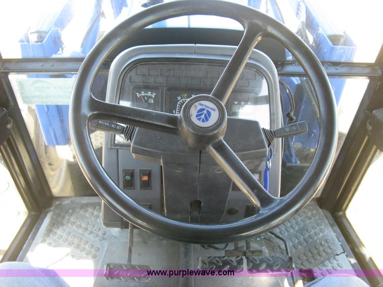 image for item J2886 1996 New Holland 7740 MFWD tractor