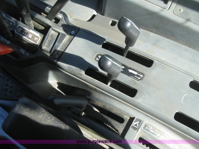 image for item J2886 1996 New Holland 7740 MFWD tractor