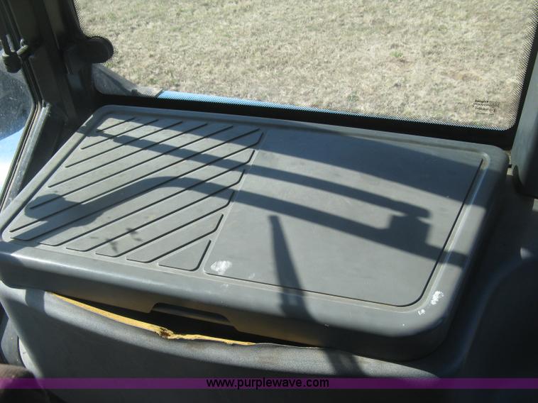 image for item J2886 1996 New Holland 7740 MFWD tractor