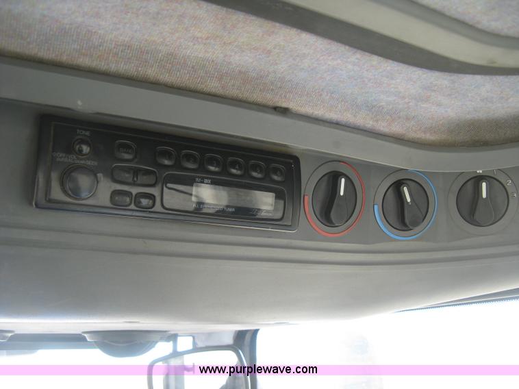 image for item J2886 1996 New Holland 7740 MFWD tractor