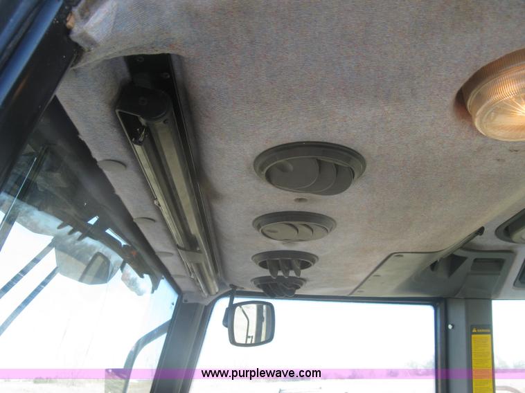 image for item J2886 1996 New Holland 7740 MFWD tractor