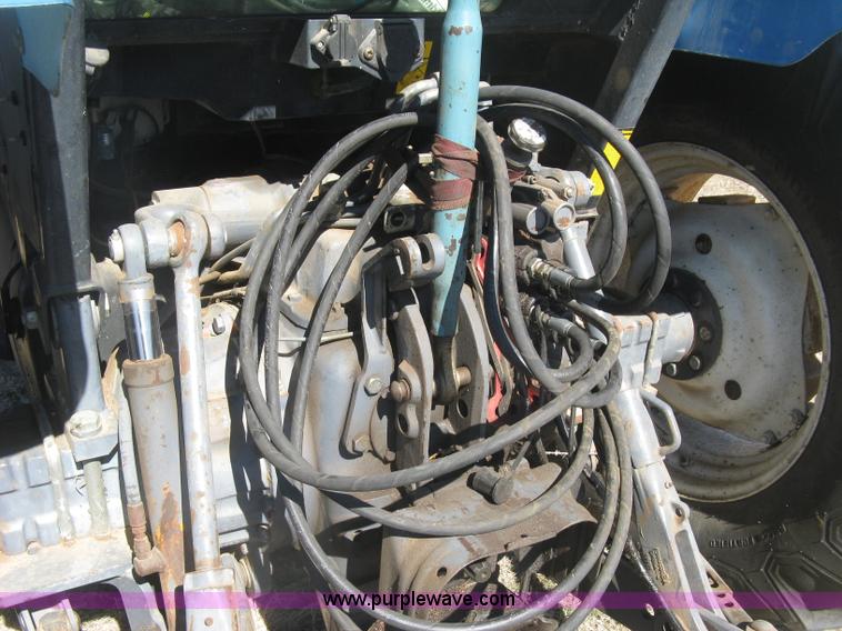 image for item J2886 1996 New Holland 7740 MFWD tractor