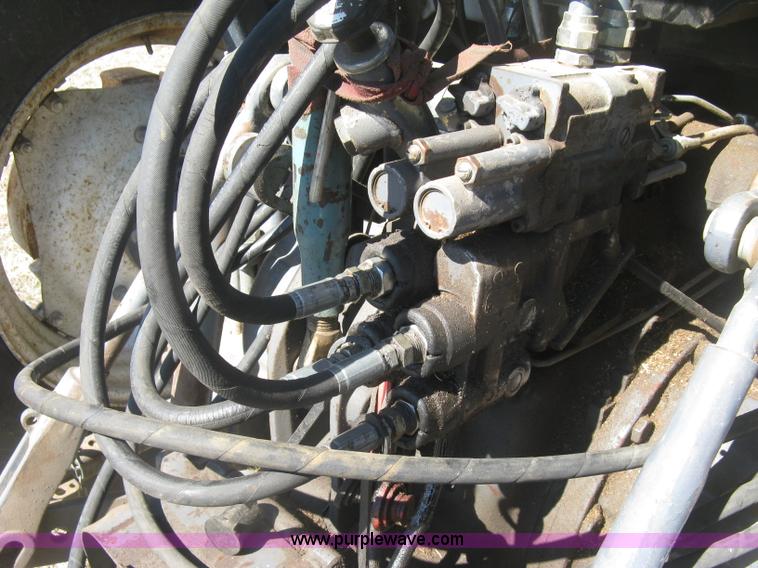 image for item J2886 1996 New Holland 7740 MFWD tractor