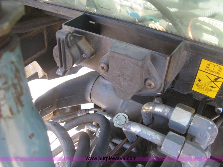 image for item J2886 1996 New Holland 7740 MFWD tractor