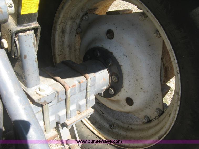 image for item J2886 1996 New Holland 7740 MFWD tractor