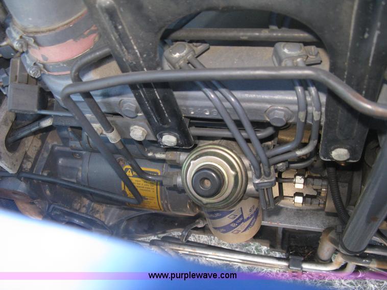 image for item J2886 1996 New Holland 7740 MFWD tractor