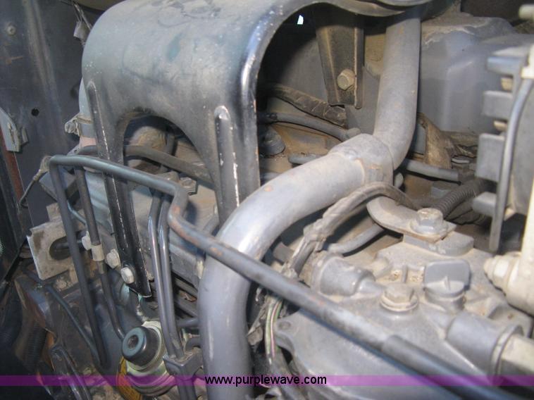 image for item J2886 1996 New Holland 7740 MFWD tractor