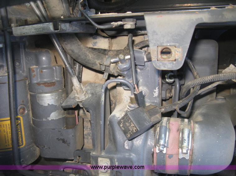 image for item J2886 1996 New Holland 7740 MFWD tractor