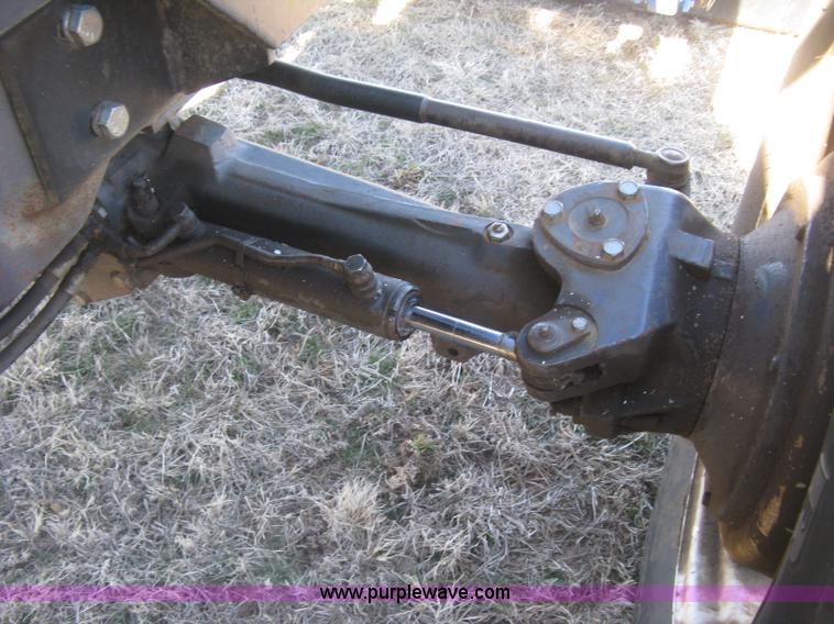 image for item J2886 1996 New Holland 7740 MFWD tractor