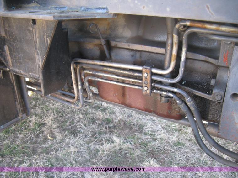 image for item J2886 1996 New Holland 7740 MFWD tractor