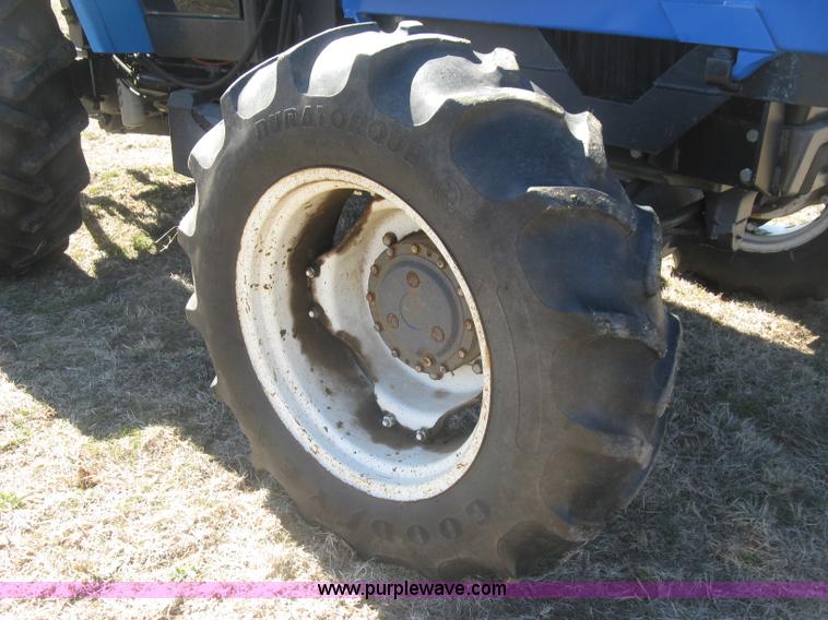 image for item J2886 1996 New Holland 7740 MFWD tractor