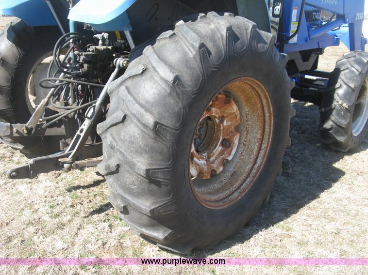 image for item J2886 1996 New Holland 7740 MFWD tractor