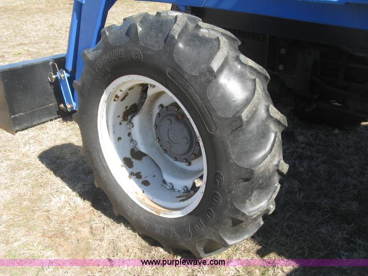 image for item J2886 1996 New Holland 7740 MFWD tractor