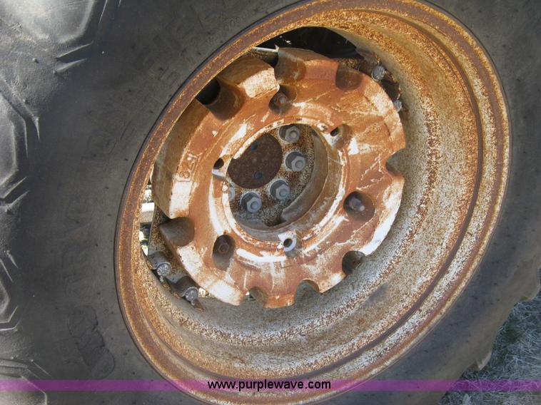 image for item J2886 1996 New Holland 7740 MFWD tractor