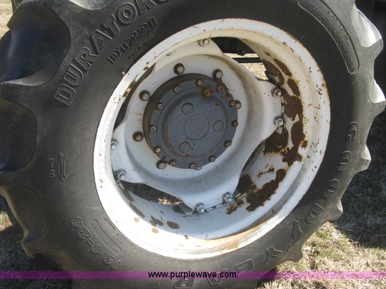 image for item J2886 1996 New Holland 7740 MFWD tractor