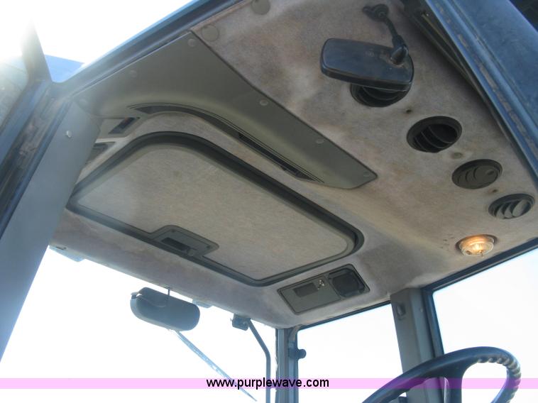 image for item J2886 1996 New Holland 7740 MFWD tractor