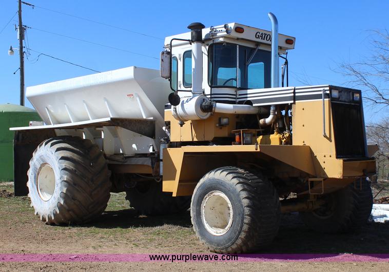 image for item J7559 Ag-Chem TerraGator 1664 self-propelled dry spreader applicator