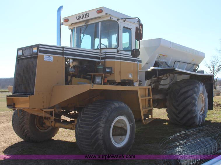 image for item J7559 Ag-Chem TerraGator 1664 self-propelled dry spreader applicator