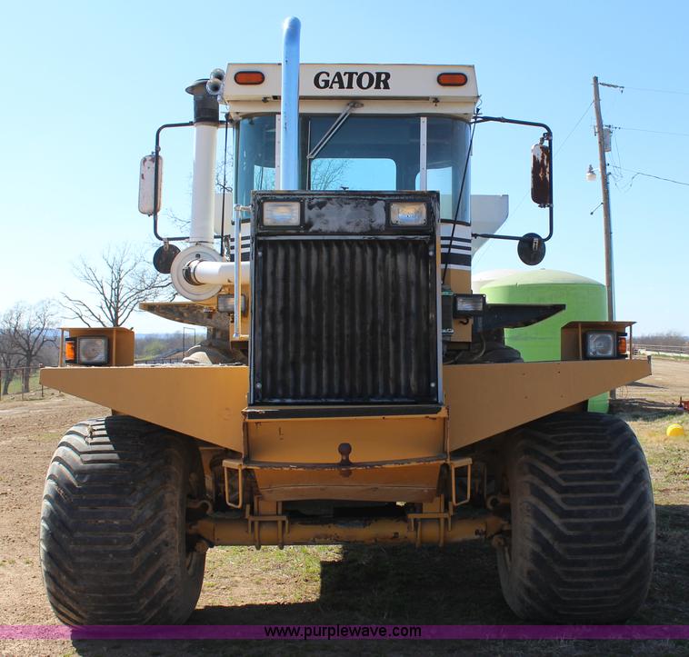 image for item J7559 Ag-Chem TerraGator 1664 self-propelled dry spreader applicator