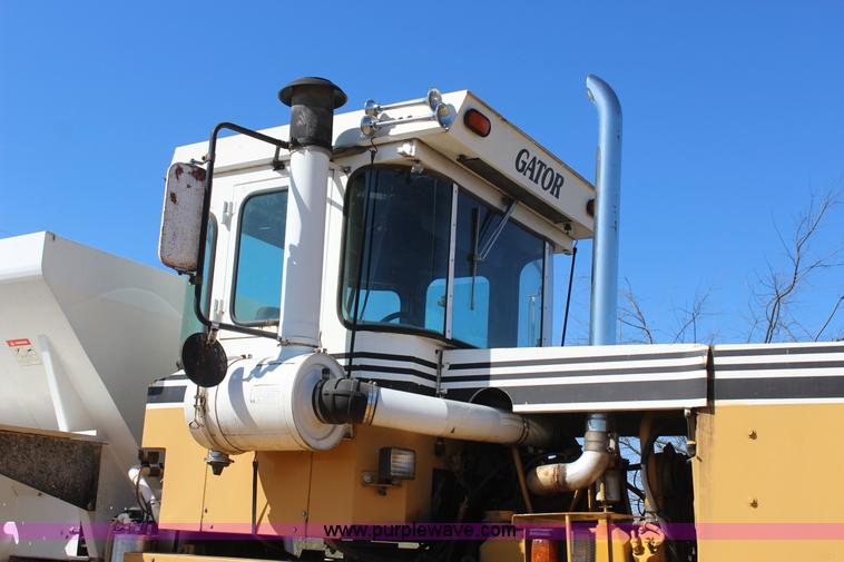 image for item J7559 Ag-Chem TerraGator 1664 self-propelled dry spreader applicator