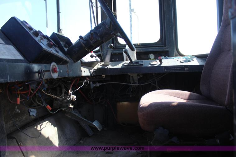 image for item J7559 Ag-Chem TerraGator 1664 self-propelled dry spreader applicator