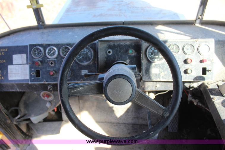 image for item J7559 Ag-Chem TerraGator 1664 self-propelled dry spreader applicator