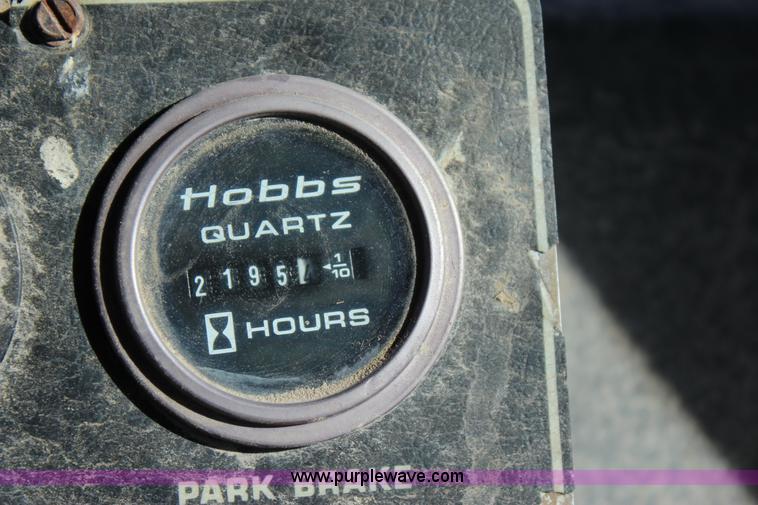 image for item J7559 Ag-Chem TerraGator 1664 self-propelled dry spreader applicator