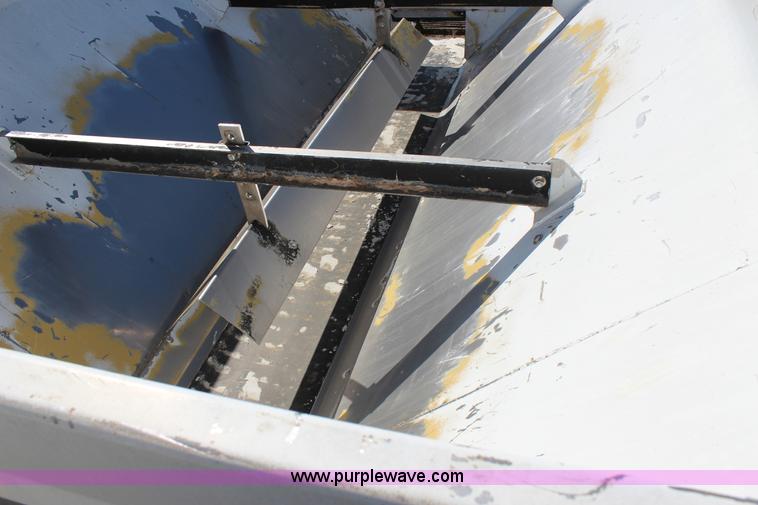 image for item J7559 Ag-Chem TerraGator 1664 self-propelled dry spreader applicator