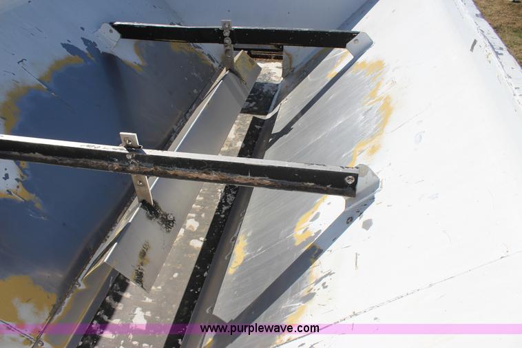 image for item J7559 Ag-Chem TerraGator 1664 self-propelled dry spreader applicator