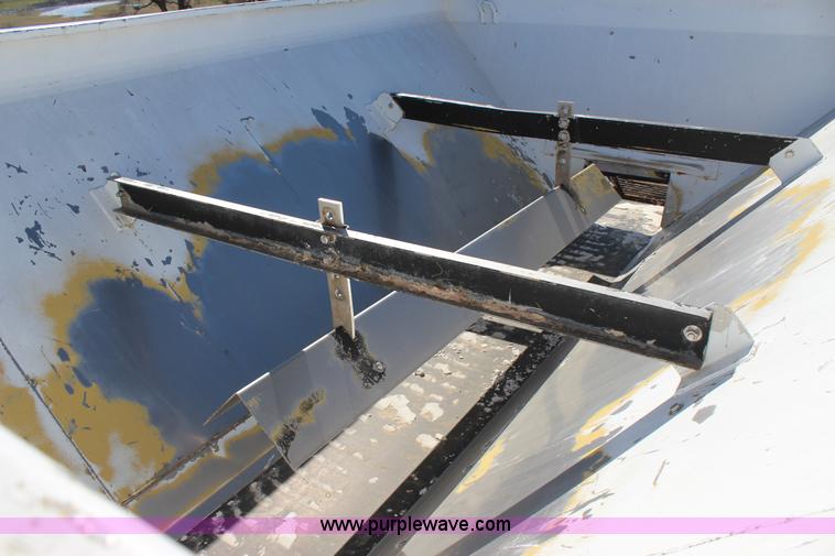 image for item J7559 Ag-Chem TerraGator 1664 self-propelled dry spreader applicator